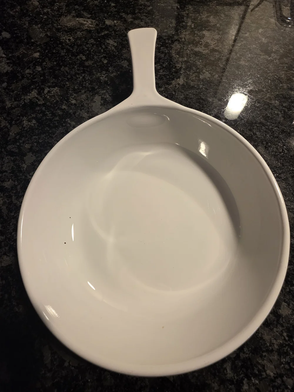 The Corning Ware Wildflower Saucepan/Skillet with Pyrex Lids.